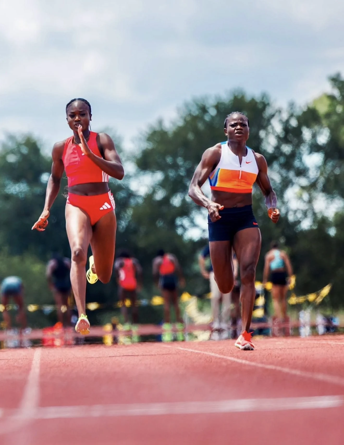 Two athletes racing side by side at ATX Classic